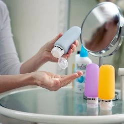 TRVLMORE Silicone Reisflesjes - Navulbaar - Handbagage - 100 ML - 3 Stuks - Oranje/Paars/Blauw -Lichaamsverzorging 1200x1200 398